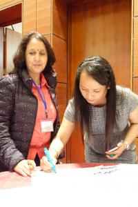Yamuna Ghale signing her action plan